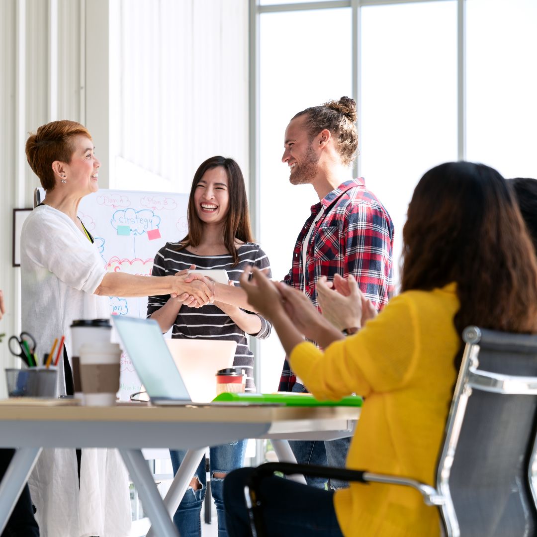 employees with happy customer