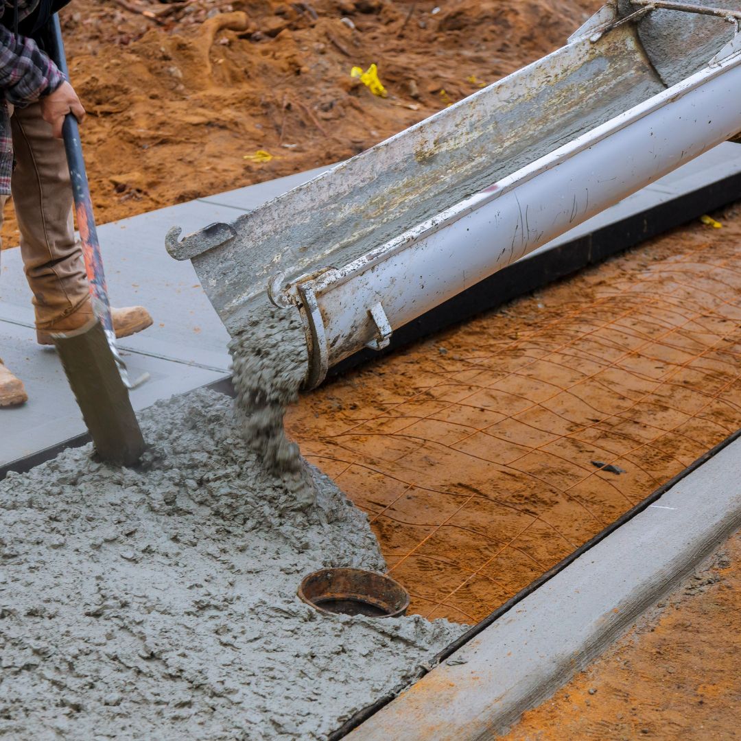 A construction site where concrete is being poured