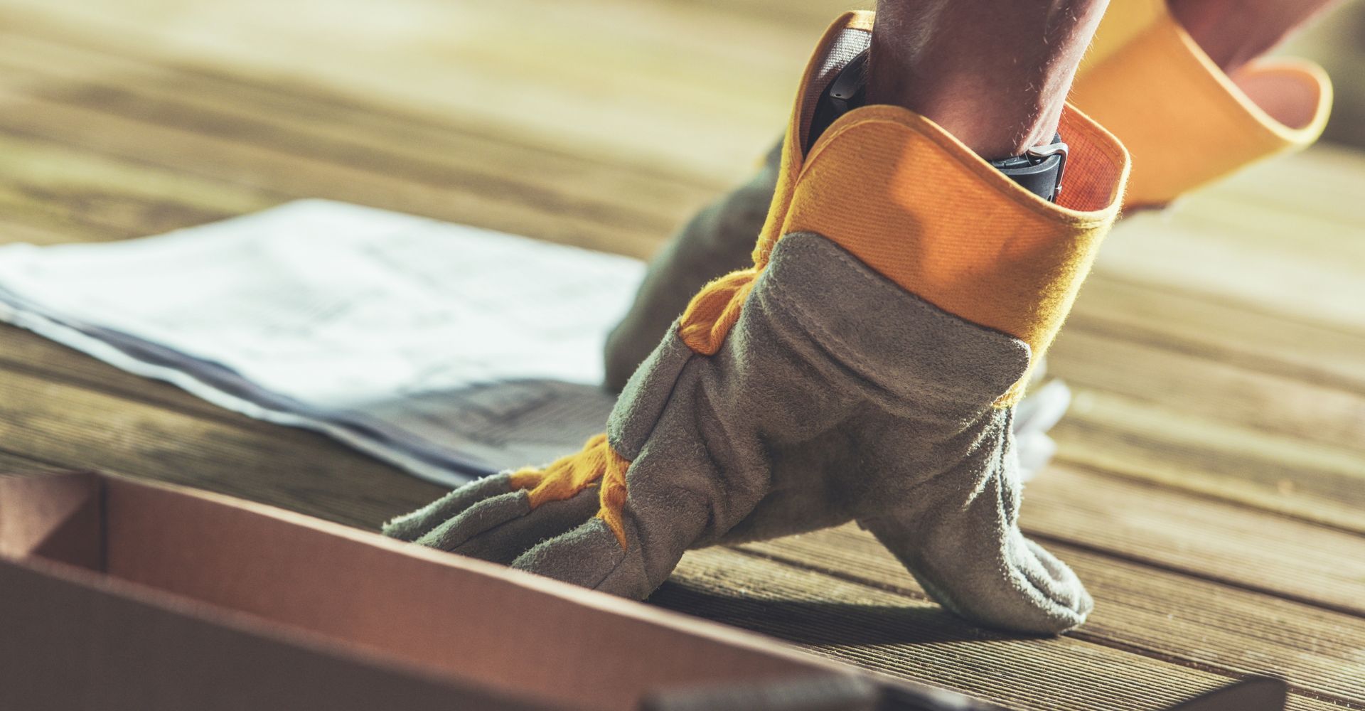 A construction worker wearing gloves
