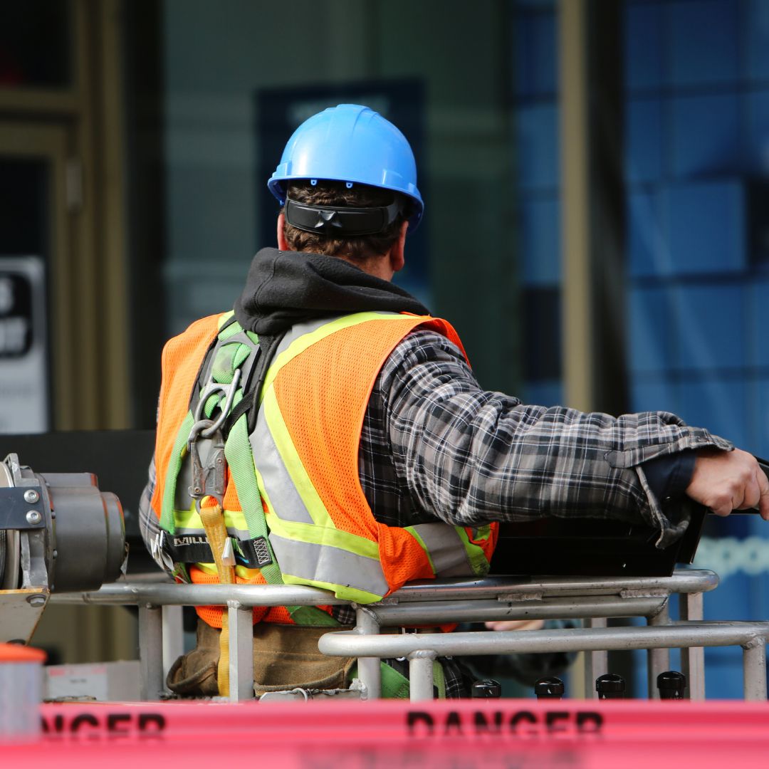 worker in vest and hard hat