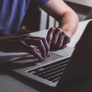 working on laptop