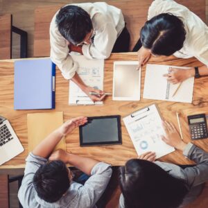 employees looking at paperwork