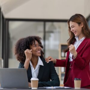manager congratulating a staff member